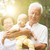 Grandfather, grandmother and grandchild outdoors. stock photo © szefei