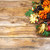 Fall greeting with berries and cones wreath, copy space stock photo © TasiPas