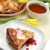 Tea cup, tulips and piece of an apple pie stock photo © Tatik22