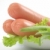 Fresh sausages on a plate with vegetables. stock photo © Tatik22
