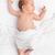 drăguţ · nou-nascut · copil · pat · fericit - imagine de stoc © tommyandone