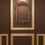 Golden empty frame on wooden wall in Luxurious interior. Old exh stock photo © Victoria_Andreas