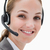 Smiling female call center agent working against a white background stock photo © wavebreak_media