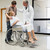 médico · risonho · mulher · grávida · cadeira · de · rodas · parceiro · hospital - foto stock © wavebreak_media