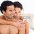 Romantic lovers embracing lying in bed stock photo © wavebreak_media