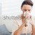 Young man blowing his nose in his living room stock photo © wavebreak_media