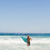 jovem · homem · praia · corrida · água - foto stock © wavebreak_media