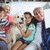Parents and their children on sofa with labrador stock photo © wavebreak_media