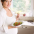 Pregnant woman having bowl of salad stock photo © wavebreak_media