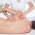 Physiotherapist doing back massage to her patient stock photo © wavebreak_media