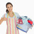 微笑的女人 · 圍裙 · 洗衣籃 · 快樂 - 商業照片 © wavebreak_media