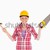 Attractive woman holding a saw and a hammer while standing against a white background stock photo © wavebreak_media
