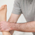 Close-up of a physiotherapist manipulating an ankle in a room stock photo © wavebreak_media
