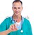 Portrait of a mature doctor holding a syringe stock photo © wavebreak_media