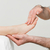 Practitioner holding the foot of a patient in a room stock photo © wavebreak_media