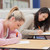Students writing in the exam hall in college stock photo © wavebreak_media