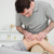 Physiotherapist pressing on the knee of a patient indoors stock photo © wavebreak_media