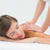 Attractive woman receiving shoulder massage at spa center stock photo © wavebreak_media
