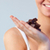Close-up of an attractive woman holding chocolate focus on woman  stock photo © wavebreak_media