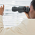 Businesswoman peeking with binoculars through blinds stock photo © wavebreak_media