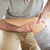 Chiropractor massaging a patient's knee in a room stock photo © wavebreak_media