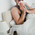 Portrait of a young man blowing his nose in his bedroom stock photo © wavebreak_media