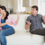 Young people disputing on the couch in the living room stock photo © wavebreak_media
