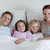 Young family sharing the bed stock photo © wavebreak_media