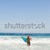homem · corrida · água · prancha · de · surfe - foto stock © wavebreak_media