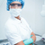 femenino · dentista · mascarilla · quirúrgica · gafas · de · seguridad · retrato - foto stock © wavebreak_media