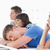 A group of listening students in class as another student has fallen asleep  stock photo © wavebreak_media