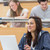 Girl sitting in lecture hall using laptop and smiling stock photo © wavebreak_media