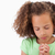 Cute girl praying against a white background stock photo © wavebreak_media