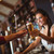 Female bar tender giving glass of beer to customer stock photo © wavebreak_media