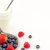 jogurt · jagody · biały · tle · deser · łyżka - zdjęcia stock © wavebreak_media