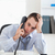 Close up of frustrated businessman trying to solve a problem on the phone stock photo © wavebreak_media
