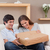 Young couple on the sofa opening parcel stock photo © wavebreak_media
