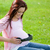 Joyful pregnant woman with headphones on her belly stock photo © wavebreak_media