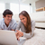Young couple with laptop on the carpet stock photo © wavebreak_media