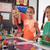 smiling teacher and schoolkids standing in drawing classroom stock photo © wavebreak_media