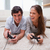 Young couple playing video games together stock photo © wavebreak_media