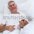 Man lying down on his bed stock photo © wavebreak_media