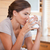 Side view of young woman enjoying a cup of coffee stock photo © wavebreak_media