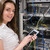 улыбающаяся · женщина · серверы · центр · обработки · данных · работу · сеть - Сток-фото © wavebreak_media