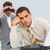 Angry businessman annoyed by a man looking through binoculars stock photo © wavebreak_media