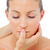 Charming woman having a head massage in a spa   stock photo © wavebreak_media