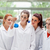 Cute science students looking at a flask in a laboratory stock photo © wavebreak_media