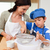 Son and mother preparing dough together stock photo © wavebreak_media