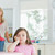 Child sitting at kitchen table looking angry with mother watching on stock photo © wavebreak_media