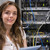 Smiling woman standing in front of servers in data storage stock photo © wavebreak_media